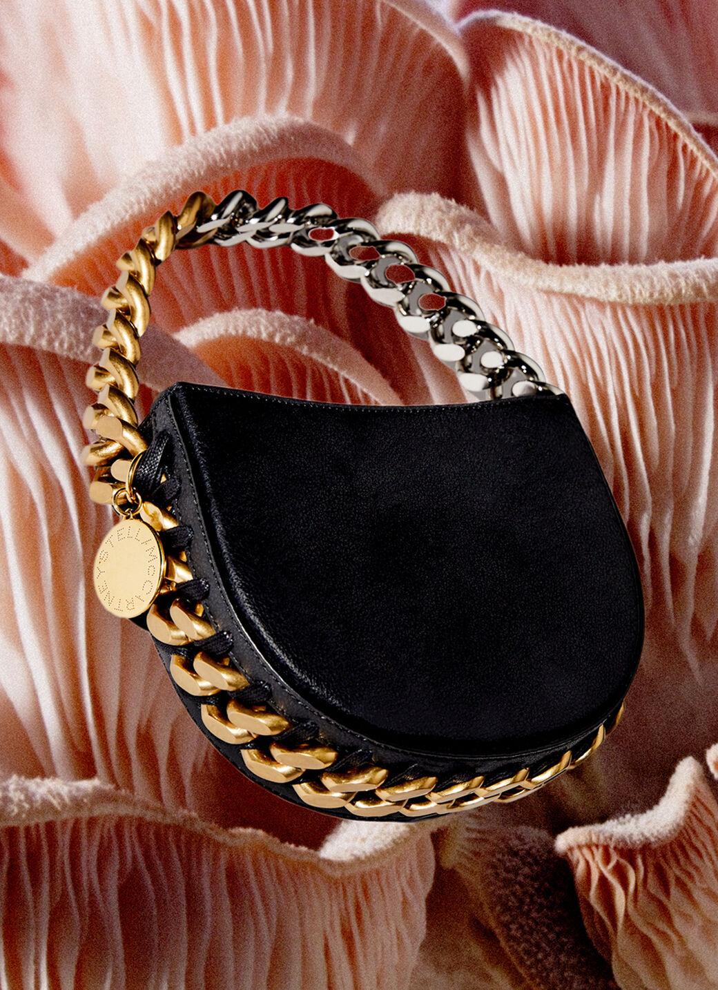Stella McCartney Frayme Mylo bag against mushroom gills